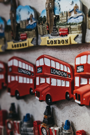 London, UK - March 9, 2019: London red double decker bus souvenir fridge magnet on sale at a street market. London is one of the most visited cities in the world.のeditorial素材