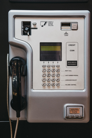London, UK - March 9, 2019: Close up of a New World Payphone in the London's West End. New World Payphones are replacing old Red Telephone boxes on the high streets across UK.のeditorial素材