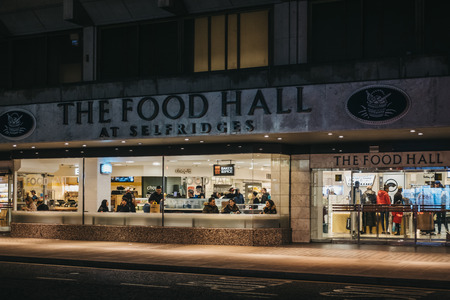 London, UK - March 9, 2019: Street view of people inside Selfridges food hall on Oxford Street, London. Selfridges is the second largest shop in the UK that opened on 15 March 1909.のeditorial素材