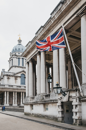 London, UK - March 16, 2019: Union Jack flag on University of Greenwich building, London. The University was established in 1890 and is located on the banks of the River Thames in South London.のeditorial素材