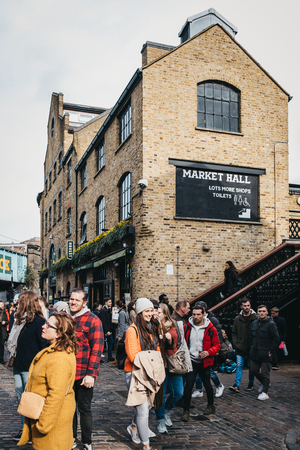 London, UK - March 23,2019: People walking inside Camden Market, London. Started with 16 stalls in March 1974, Camden Market is one of the busiest retail destinations in London.のeditorial素材