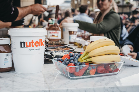 London, UK - March 23,2019: Nutella and fruits at Dutch pancakes stall inside Camden Market, London....