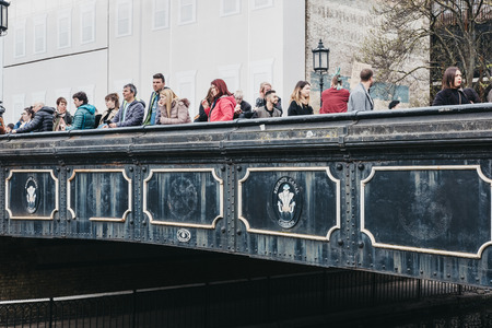 London, UK - March 23, 2019: People on a bridge over the Regent's Canal near Camden Market, London. In 2020 the Regentâs Canal will be 200 years old.のeditorial素材