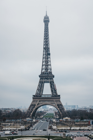 Daytime full length view of Eiffel Tower in Paris, France.の写真素材