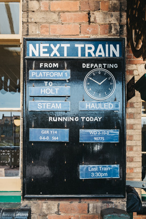 Sheringham, UK - April 21, 2019: Next train announcement for The Poppy Line train, also known as the North Norfolk Railway, a Heritage Steam Railway that runs from Sheringham to Holt, Nortfolk.のeditorial素材