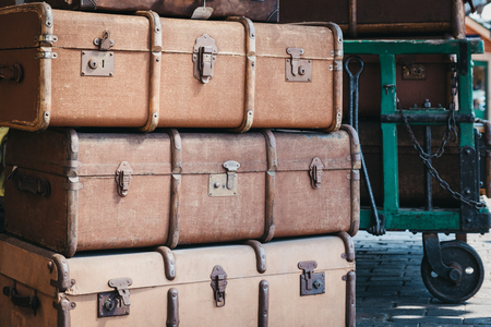 Sheringham, UK - April 21, 2019: Retro decorative suitcases on the platform of Sheringham train station on a sunny spring day. Sheringham is an English seaside town within the county of Norfolk, UK.のeditorial素材