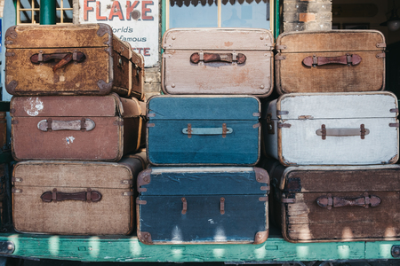 Sheringham, UK - April 21, 2019: Retro decorative suitcases on the platform of Sheringham train station on a sunny spring day. Sheringham is an English seaside town within the county of Norfolk, UK.のeditorial素材