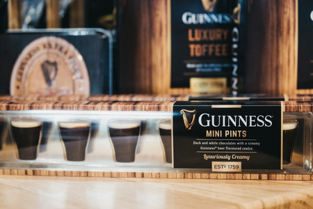 Elveden, UK - April 21, 2019: Guinness mini pints chocolates on sale. Guinness is one of the most successful beer brands worldwide, brewed in almost 50 countries, and available in over 120.のeditorial素材