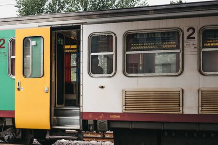 Dommeldange, Luxembourg - May 18, 2019: Old train on a platform at Dommeldange station, a station...