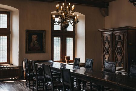 Vianden, Luxembourg - May 18, 2019: Recreated exhibit of a dining room inside Vianden Castle,...