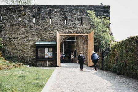 Vianden, Luxembourg - May 18, 2019: People walking on the path towards Vianden Castle, Luxembourg,...