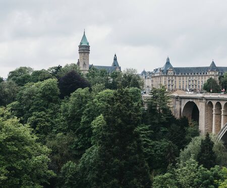 Luxembourg City, Luxembourg - May 19, 2019: Panoramic view of Adolphe Bridge over a park in Luxembourg City. One third of the surface of the city is shaped by beautifully landscaped green spaces.のeditorial素材