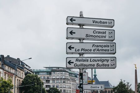 Luxembourg City, Luxembourg - May 18, 2019: Directional arrow signs to places of interest from Constitution Square in Luxembourg City, the capital of a small European country with same name.のeditorial素材