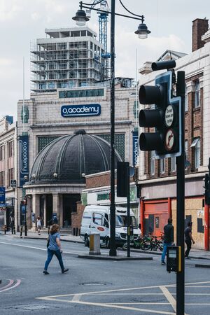 London, UK - July 16, 2019: People walking on a street in London in front of Brixton O2 Academy, one of Londons leading music venues, nightclubs and theatres.のeditorial素材