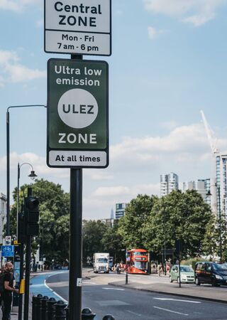London, UK - July 16, 2019: Signs indicating Ultra Low Emission Zone (ULEZ) on a street in Vauxhall, London. ULEZ was introduced in 2019 to help improve air quality in the capital.のeditorial素材