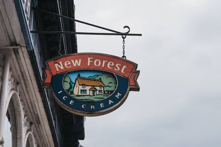Lymington, UK - July 14, 2019: New Forest Ice-Cream sign outside a shop on a street in Lymington, New Forest, a historic coastal town with an ancient seaport and a rich maritime history.のeditorial素材