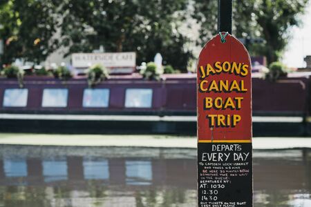 London, UK - July 18, 2019: Jasons Canal Boat Trip sign on Regents Canal in Little Venice, London, a tranquil area of the city where the Grand Union and Regentâs canals meet.のeditorial素材