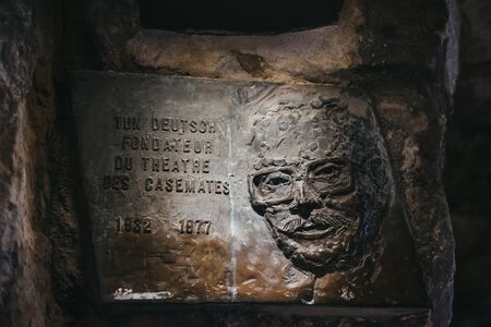 Luxembourg City, Luxembourg - May 19, 2019: Memorial plaque inside Bock Casemates, a vast complex of...