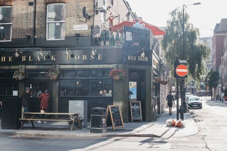 London, UK - September 07, 2019: Facade of The Black Horse pub in Aldgate, Spitalfields, a trendy area of Londons East End that is home to an array of markets, bars and restaurants.のeditorial素材