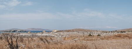 Panoramic view of the ruins on the island of Delos, Greece, an archaeological site near Mykonos in the Aegean Sea Cyclades archipelago.の写真素材
