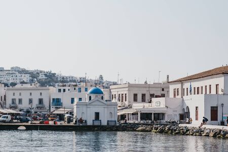 Mykonos Town, Greece - September 20, 2019: From the water view of new port in Hora, also known as Mykonos Town, capital of the island and one of the best examples of Cycladic architecture.のeditorial素材