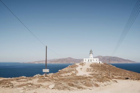 View of Armenistis Lighthouse in Mykonos, Greece, blue sky, selective focus.の写真素材