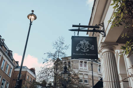 London, UK - March 06, 2020: Sign outside Petersham Nurseries in Covent Garden, London, UK. Covent Garden is a famous tourist area in London with lots of shops and restaurants.のeditorial素材