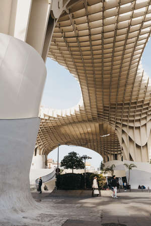 Seville, Spain - January 17, 2020: Low angle view of Metropol Parasol, the largest wooden structure in the world, in La Encarnacion square Seville, Spain.のeditorial素材