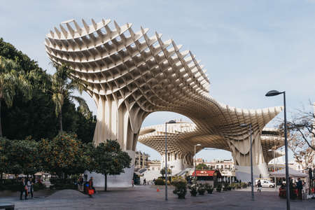 Seville, Spain - January 17, 2020:  Low angle view of Metropol Parasol, the largest wooden structure in the world, in La Encarnacion square, Seville, Spain.のeditorial素材