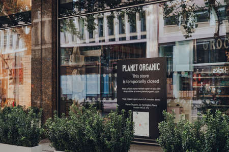 London, UK - June 13, 2020: Closure sign and notice outside Planet Organic food store in Tottenham...