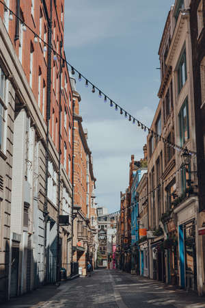 London, UK - June 13, 2020: Closed bars and restaurants in Kingly Street, famous street in Soho running from Liberty Mall and parallel and between Regent Street and Carnaby Street.のeditorial素材