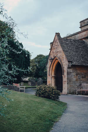 Stow-on-the-Wold, UK - July 6, 2020: Entrance of St Edwards Church, a medieval-built Church of England parish church serving Stow-on-the-Wold, selective focus.のeditorial素材