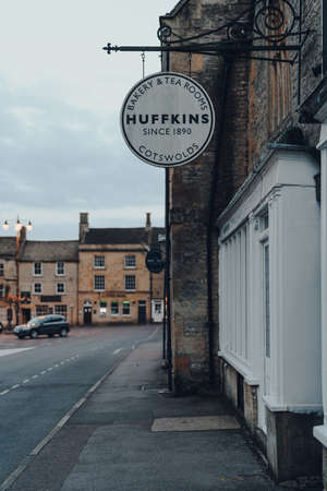 Stow-on-the-Wold, UK - July 6, 2020: Sign outside closed Huffins tea room and coffee shop in Stow-on-the-Wold, a market town in Cotswolds build on Roman Fosse Way, in the evening, selective focus.のeditorial素材