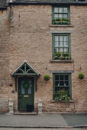 Stow-on-the-Wold, UK - July 6, 2020: Facade of a traditional limestone English house in Stow-on-the-Wold, a market town in Cotswolds build on Roman Fosse Way.のeditorial素材