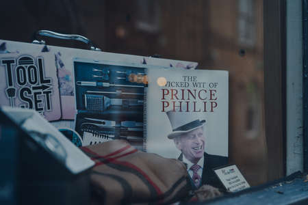 Stow-on-the-Wold, UK - July 6, 2020: The Wicked Wit of Prince Philip book on a window display of a...