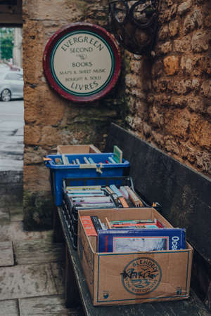 Stow-on-the-Wold, UK - July 10, 2020: Second hand books on sale outside Evergreen bookshop in Stow-on-the-Wold, a market town in Cotswolds, UK, built on Roman Fosse Way. Selective focus.のeditorial素材