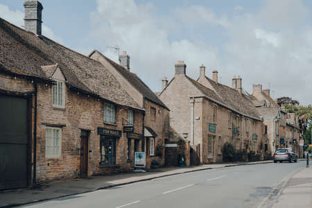Stow-on-the-Wold, UK - July 10, 2020: Row of local shops on the main street in Stow-on-the-Wold, a...