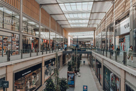 Oxford, UK - August 04, 2020: Few people walking inside The Westgate Centre, a major and typically busy shopping centre in Oxford city centre, England.のeditorial素材