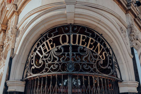 London, UK - August 20, 2020: Name on the entrance of The Queens, corner pub in Crouch End, an area in North London traditionally favoured by creatives and families.のeditorial素材