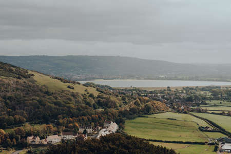 View of a Compton Bishop village from Mendip Hills, UK, on a sunny autumn day.の写真素材