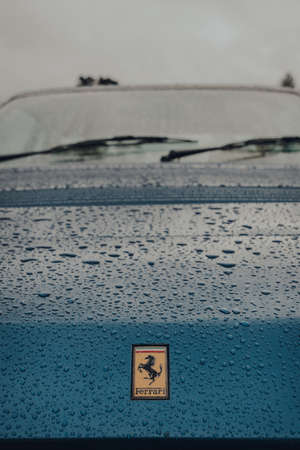 Bath, UK - October 04, 2020: Iconic logo on the bonnet of Ferrari 412, a rare model designed by...