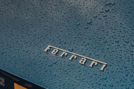 Bath, UK - October 04, 2020: Ferrari spelled out on the bonnet of Ferrari 412, a rare model designed...