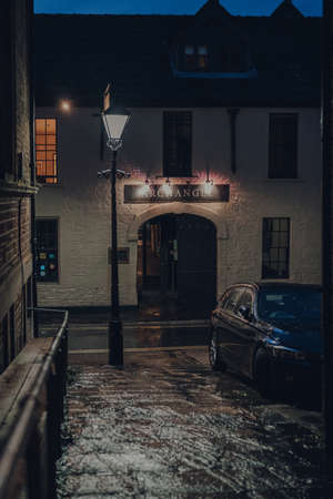 Frome, UK - October 04, 2020: Sign outside Archangel restaurant and accommodation in Frome, a market town in the county of Somerset, UK, famous for its market and independent shops. Selective focus.のeditorial素材