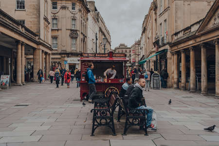 Bath, UK - October 04, 2020: Hot Sausage food cart on a street in Bath, the largest city in the county of Somerset, England, known for and named after its Roman-built baths. Selective focus.のeditorial素材