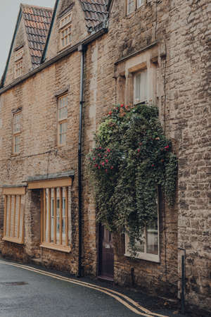 Frome, UK - October 07, 2020: Facade of a traditional stone house in Frome, a market town in the county of Somerset famous for its market and independent shops.のeditorial素材