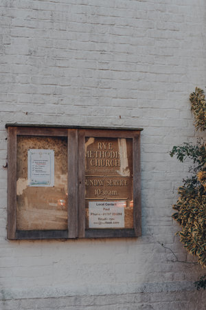 Rye, UK - October 10, 2020: Information board outside Rye Methodist Church in Rye, one of the best-preserved medieval towns in East Sussex, England.のeditorial素材