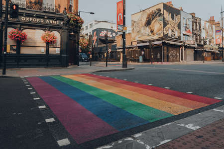 London, UK - August 12, 2020: Low angle view rainbow pedestrian crossing on High Street in Camden Town, London, a part of Pride month and in solidarity with Camdenâs LGBT+ communities.のeditorial素材