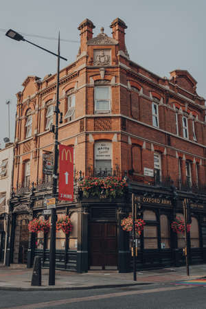 London, UK - August 12, 2020: Facade of the closed The Oxford Arms pub on empty High Street in...