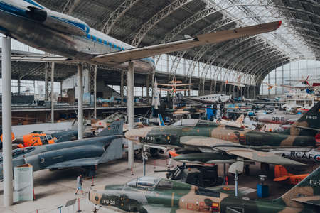 Brussels, Belgium - August 17, 2019: Variety of military and civil aircrafts inside aviation hall of The Royal Museum of the Armed Forces and Military History, famous museum in Brussels.のeditorial素材