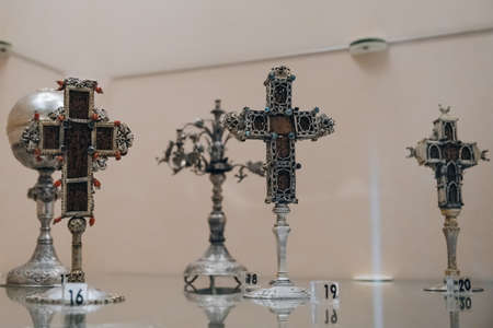Ana Mera, Greece - September 24, 2019: Orthodox crosses on exhibit inside Tourliani Monastery, a...